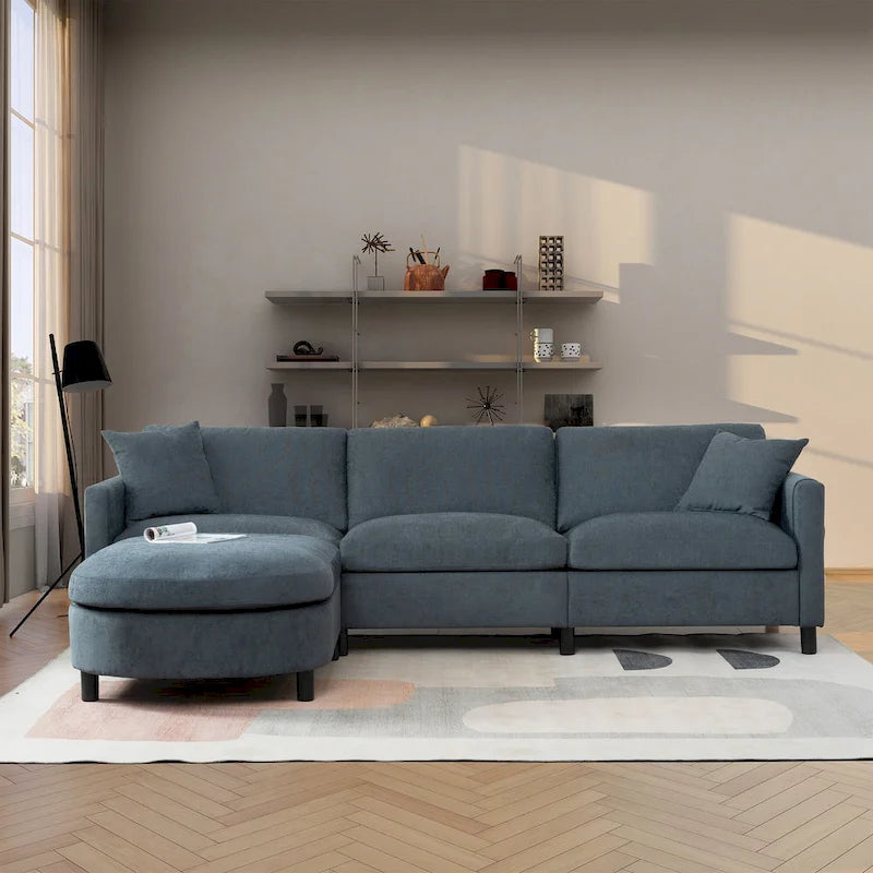 Divano componibile a 4 posti con pouf mobile e bracciolo portaoggetti – 273 cm L
