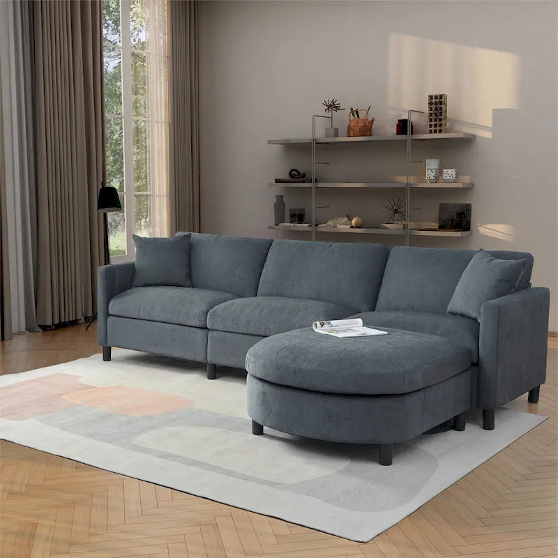 Divano componibile a 4 posti con pouf mobile e bracciolo portaoggetti – 273 cm L