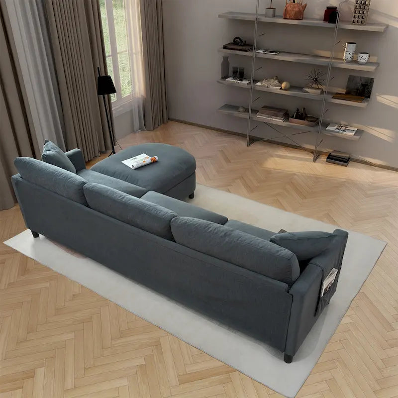 Divano componibile a 4 posti con pouf mobile e bracciolo portaoggetti – 273 cm L